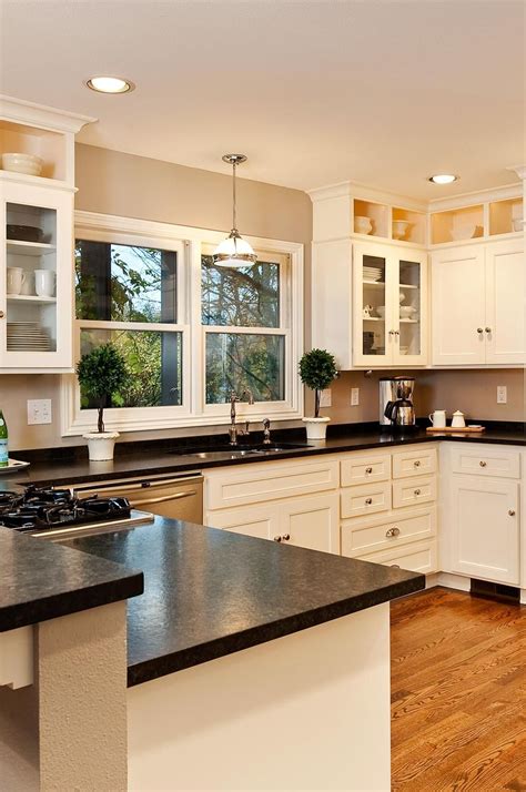 dark cabinet steel countertop|white cabinets with black granite.